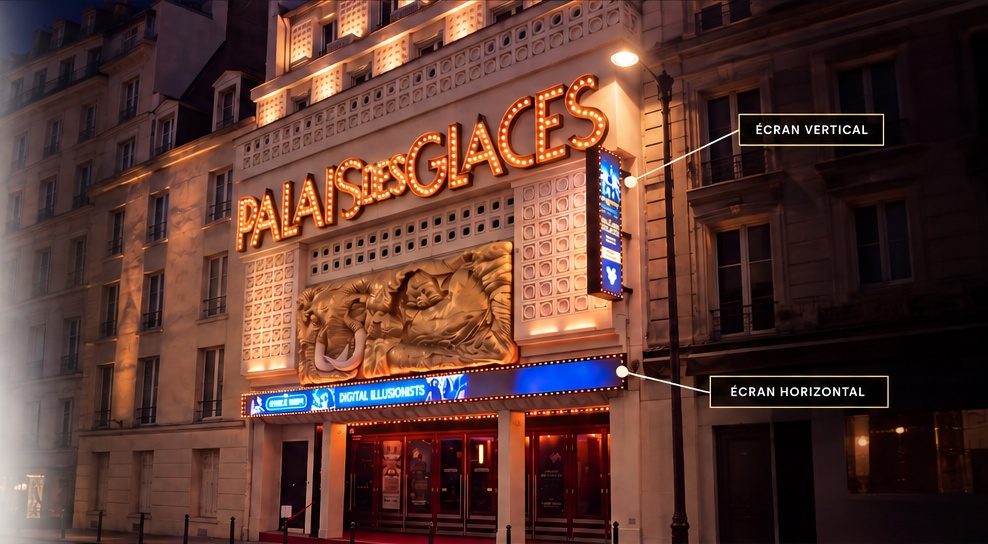 La façade illuminée du Palais des Glaces et ses écrans vidéo